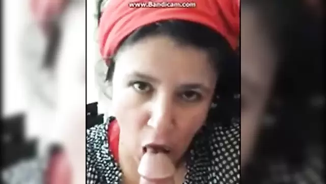 Mature woman gives a beautiful blowjob to a lake
